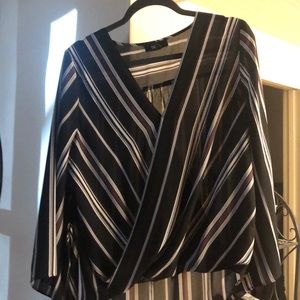 Cute dress up or down top!